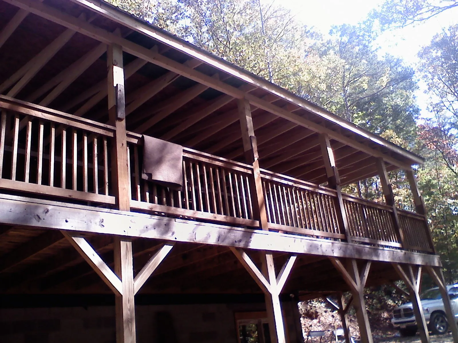 Timber framing under a new elevated porch and deck — Roof Leak Repair in Gillett by Roofing Brothers